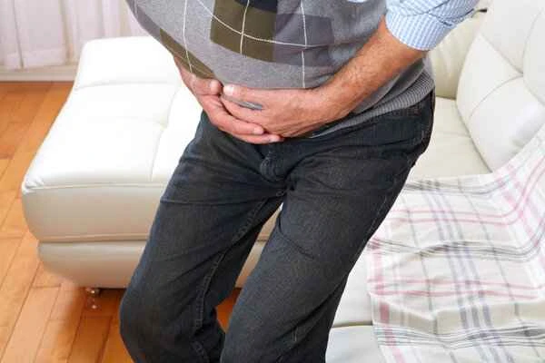 What department should I consult for scrotal pain?