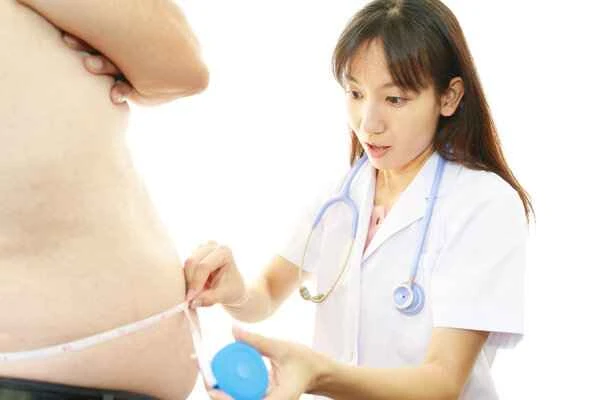 What causes scrotum to enlarge?