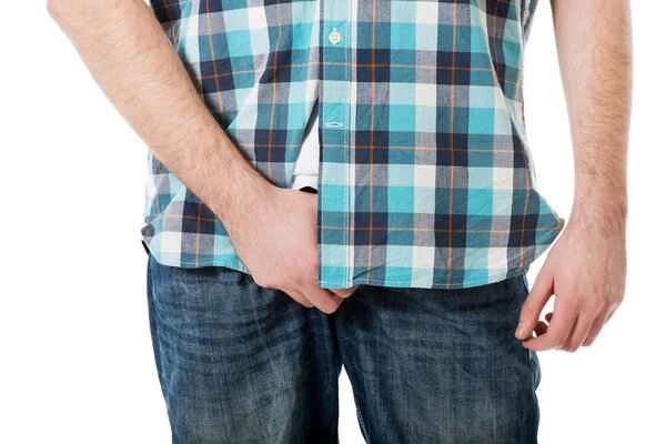 What causes pain in the outer skin of the scrotum?