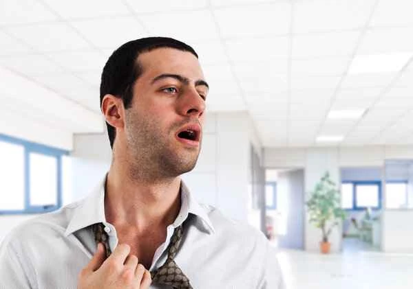 What are the symptoms of scrotal sweating?