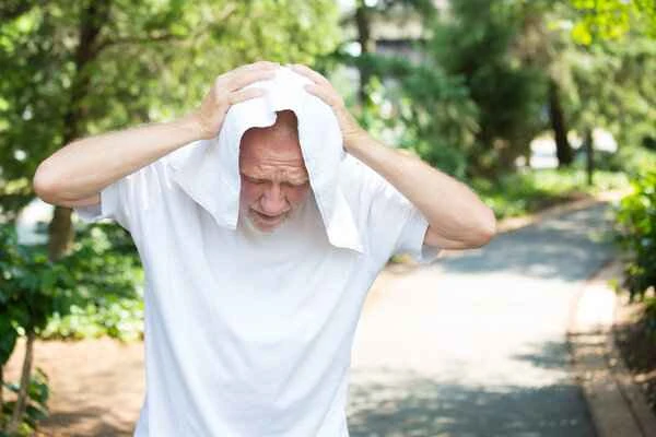 What causes excessive sweating of the scrotum?
