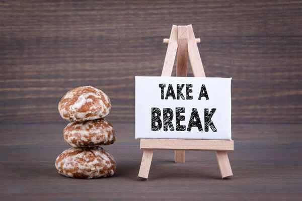 What causes long-term scrotal laxity?